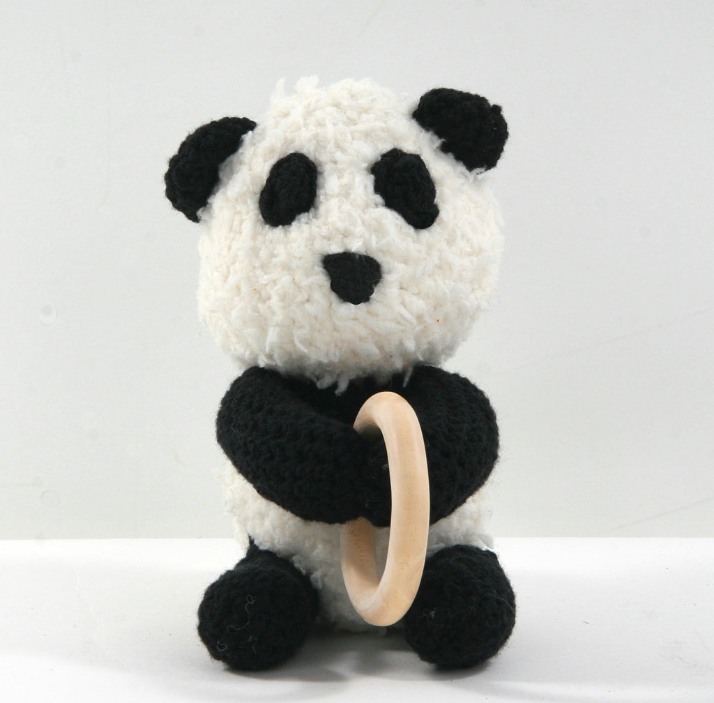 This adorable Pander teether is handmade with soft and cuddly yarn.